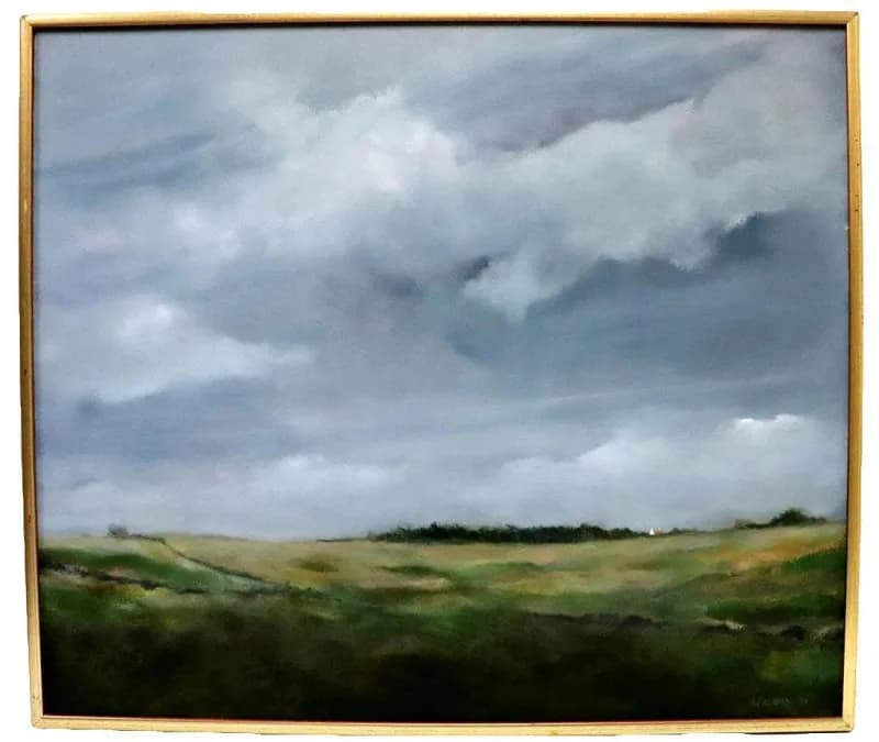 Framed oil landscape of an open field under heavy clouds